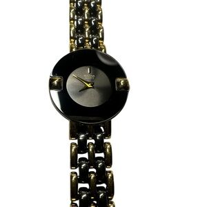 Bulova Black and Gold Watch. Brand new, old stock. Unused and perfect